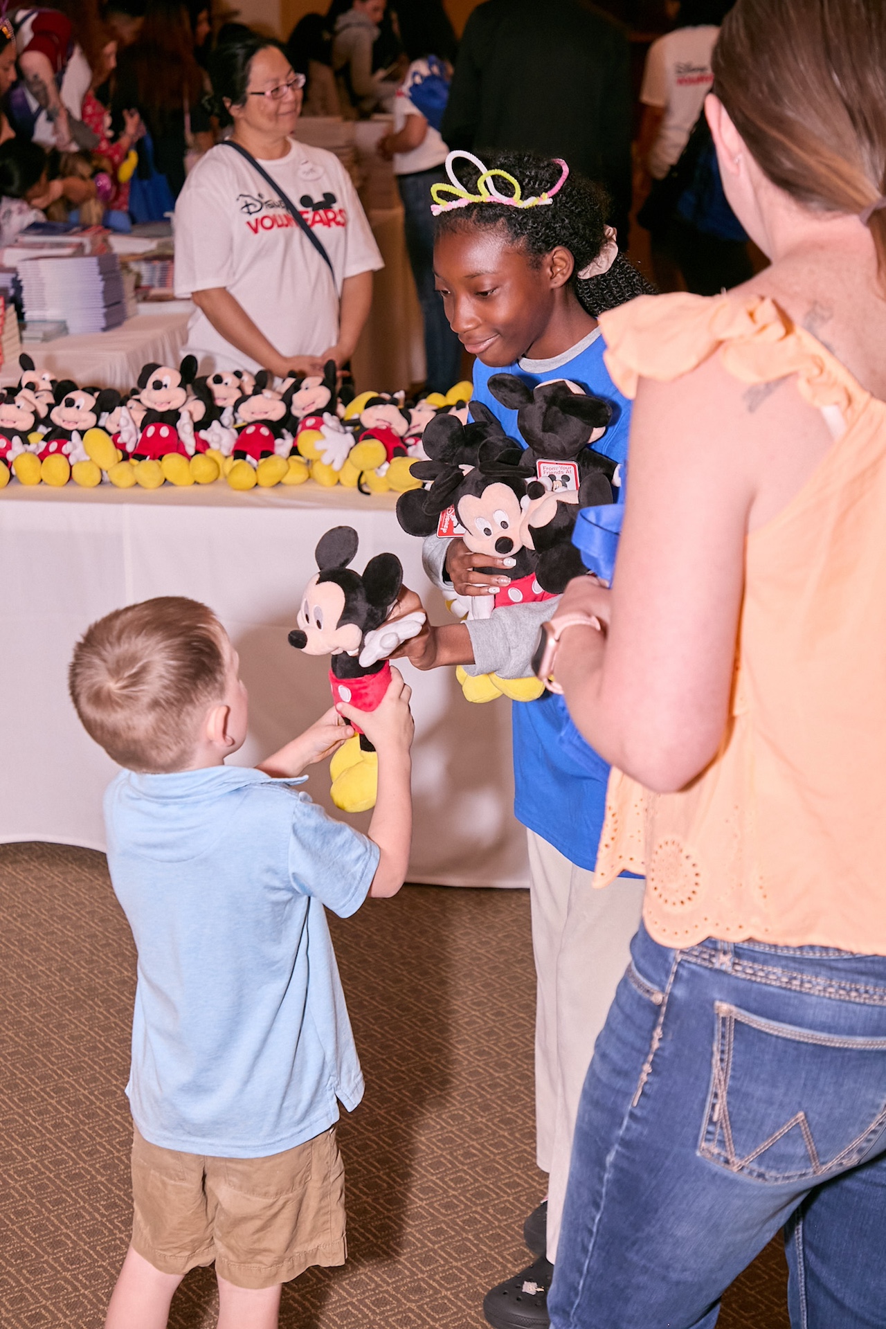 Camp Pendleton, U.S. military children and their families receiving free Disney books and other activities