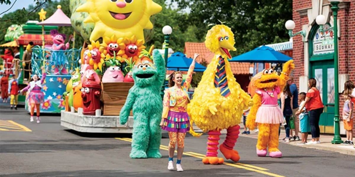 A colorful parade at Sesame Place.