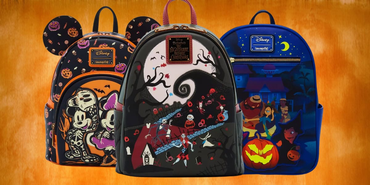 Three vibrant Disney Mini Backpacks are showcased against an orange backdrop, perfectly capturing the Halloween Style. The designs flaunt playful motifs: one with Mickey and Minnie, another with a spooky spiral hill, and a third adorned with a festive pumpkin and witch. Available at BoxLunch.