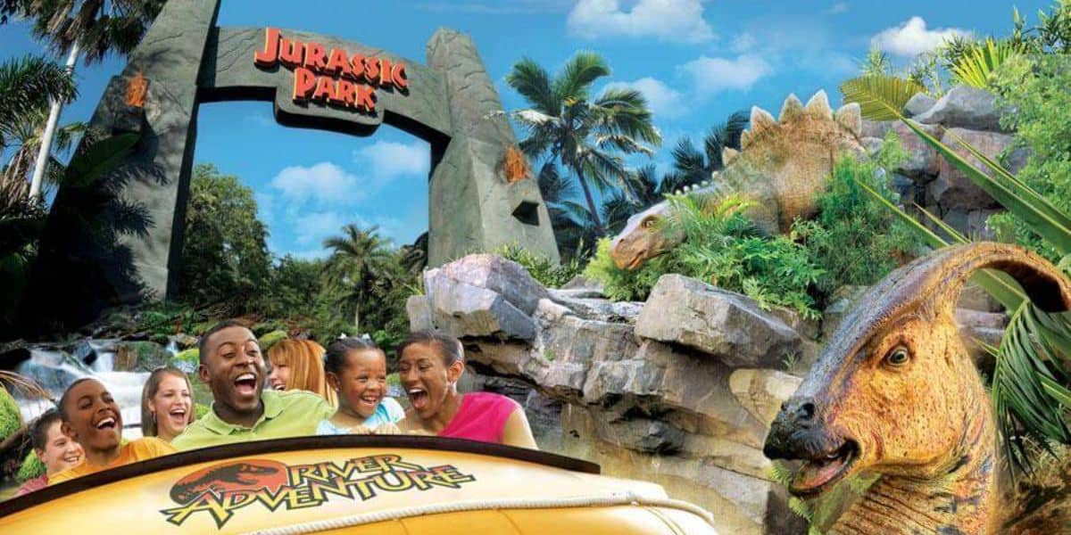 Guests ride Jurassic Park River Adventure at Universal Studios