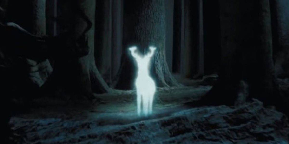 Stag Patronus glowing in a dark Forbidden Forest