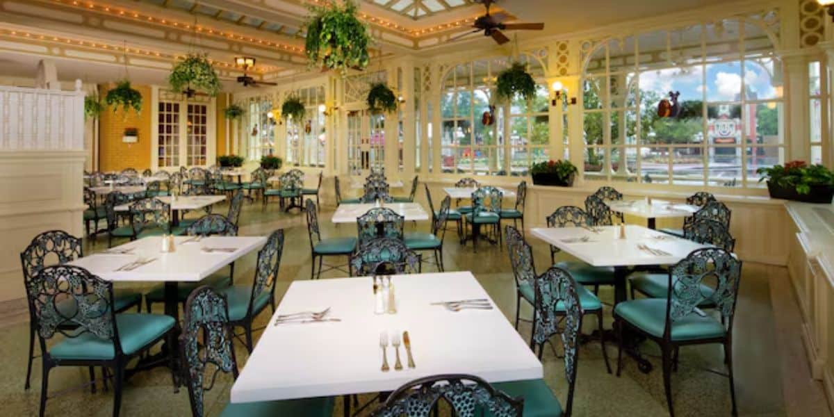 A bright and airy restaurant interior in Tony's Town Square at Magic Kingdom Park