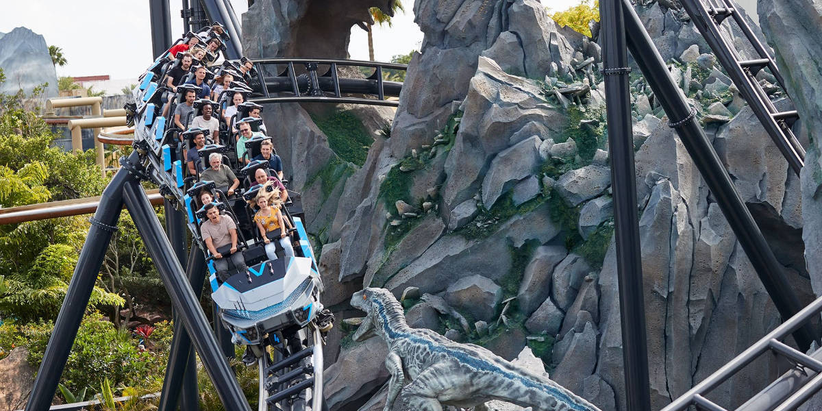 Guests ride Jurassic World VelociCoaster