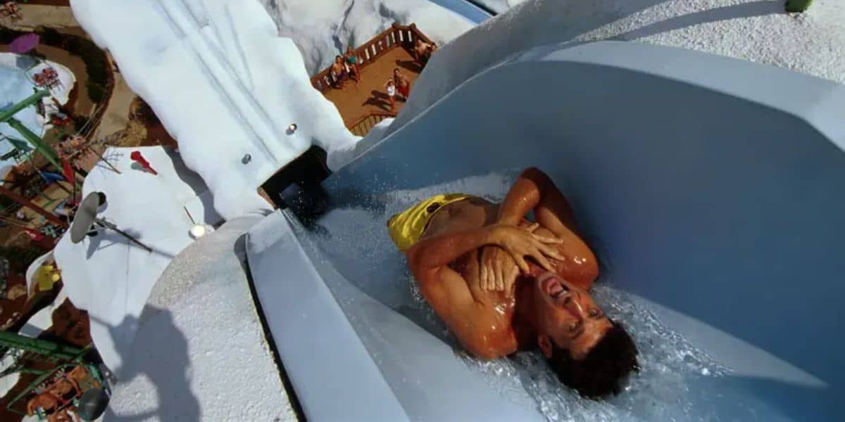 A man goes down the slide at Blizzard Beach