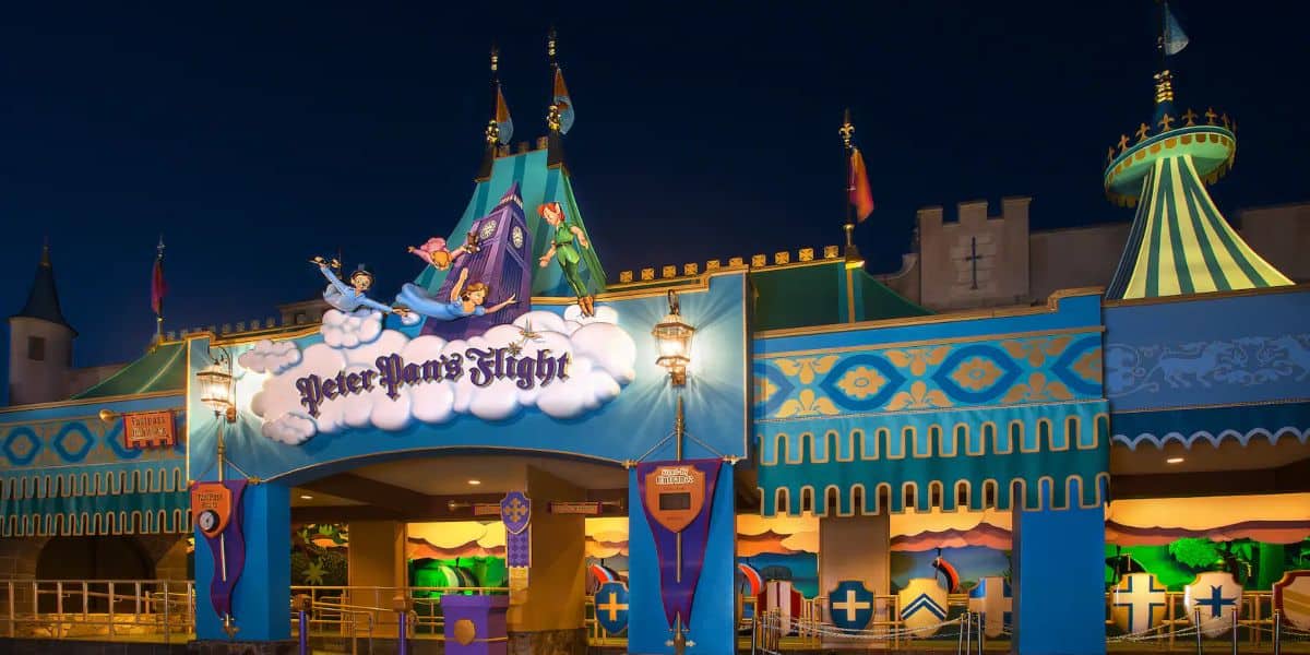 The exterior of Peter Pan's Flight lights up at night