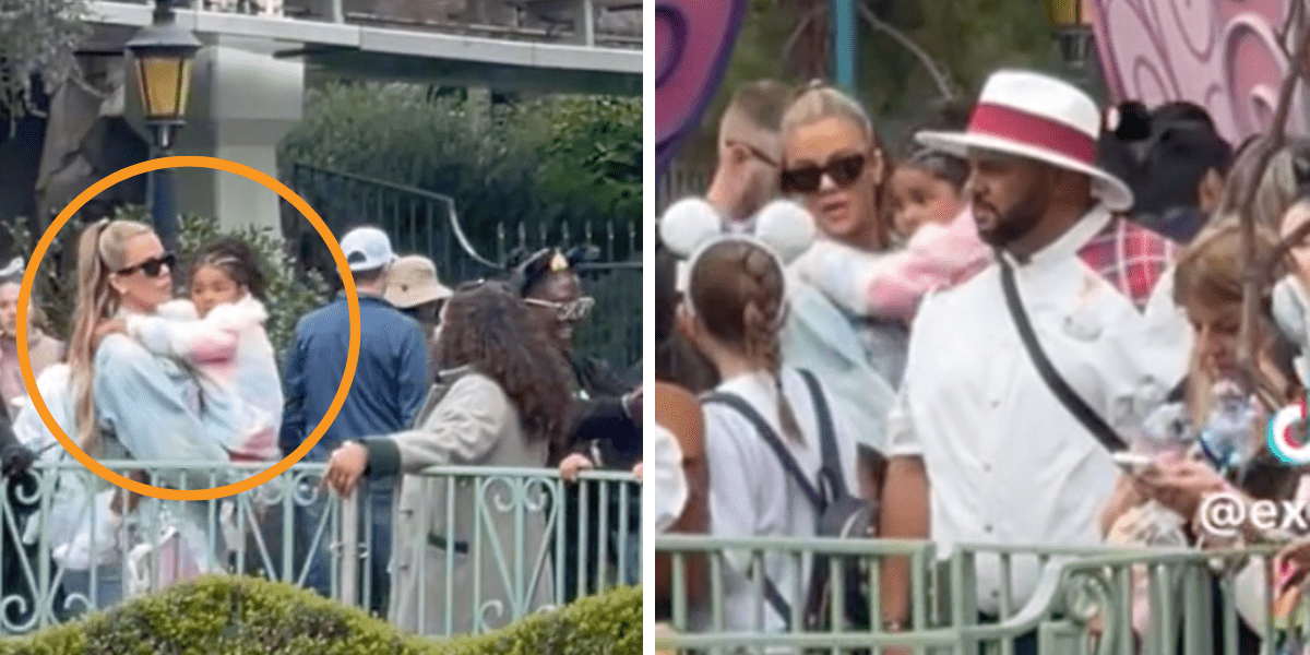 The Kardashians at Disneyland and a VIP Guide. Khloe holds her daughter as she walks to the front of the line for the teacups.