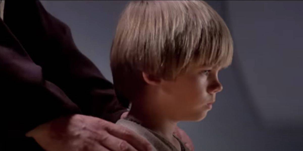 Anakin Skywalker (Jake Lloyd) mourning over Qui-Gon (Liam Neeson) in 'The Phantom Menace'