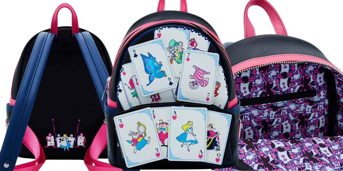 A stylish black Loungefly mini backpack with pink and blue accents, featuring a whimsical Alice in Wonderland design of playing cards and a lively pattern of animated figures inside. The cards showcase colorful, cartoon-style illustrations.