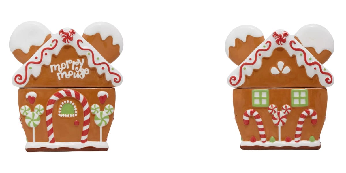 Two gingerbread house cookie jars with Mickey Mouse ears showcase Disney Magic. One is adorned with candy canes and a "Merry Mickey" sign, while the other features green windows and candy cane accents, perfect for adding festive decor to any room.