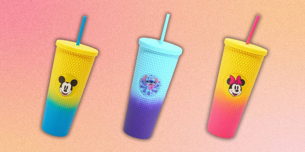 Sip in Style with these vibrant Disney-themed ombré studded carnival cups: a yellow cup featuring Mickey Mouse, a blue and purple one showcasing Stitch, and a pink cup adorned with Minnie Mouse. Set against a soothing gradient of peach tones, each textured cup comes complete with its matching lid and straw.