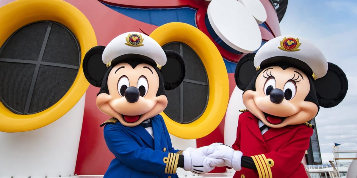 Mickey Mouse and Minnie Mouse are dressed in captain uniforms