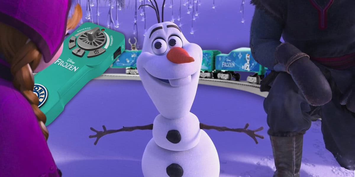 A cheerful snowman, reminiscent of Olaf from "Frozen," stands in a snowy scene, surrounded by two people. A LionChief Train Set and remote control labeled "Frozen" are set against a purple background. The atmosphere is joyful and wintry.