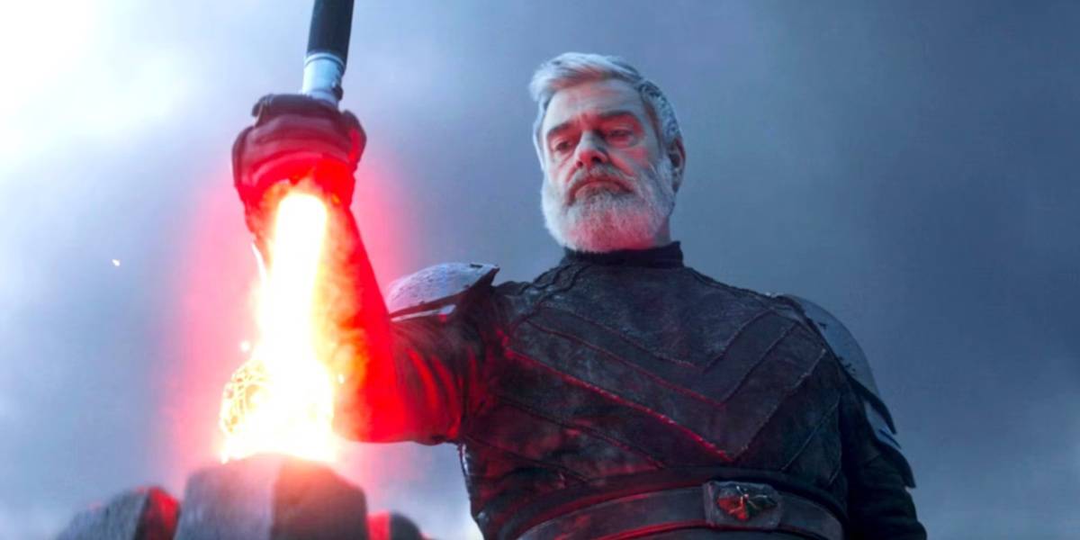 Baylan Skoll (Ray Stevenson) destroying a star map with his lightsaber