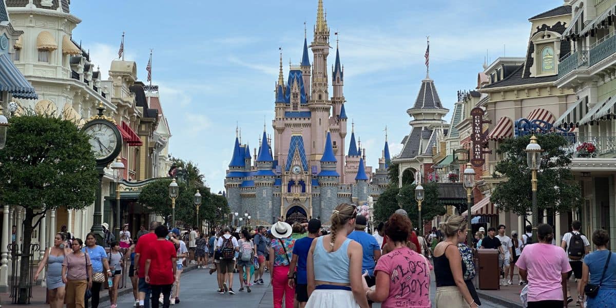 Crowds in front of Cinderella Castle at Magic Kingdom at Disney World.