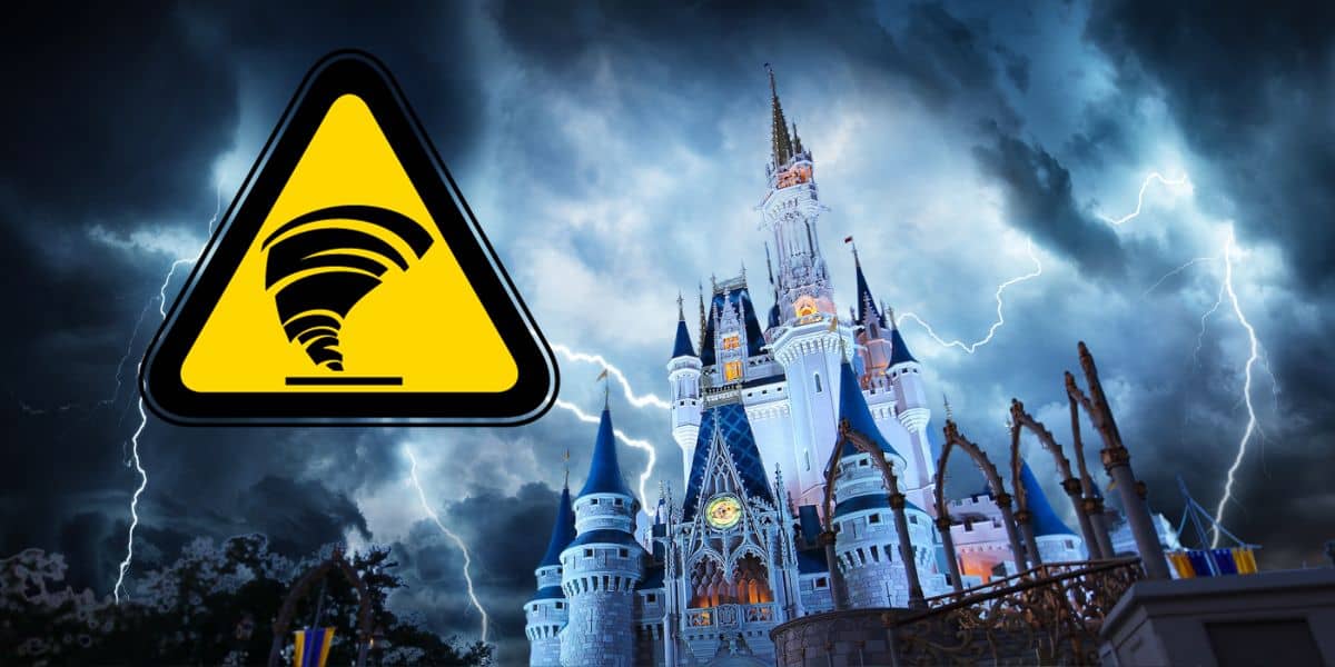 Stormy weather with lightning striking all around at Magic Kingdom in Disney World with a tornado warning sign to the left.