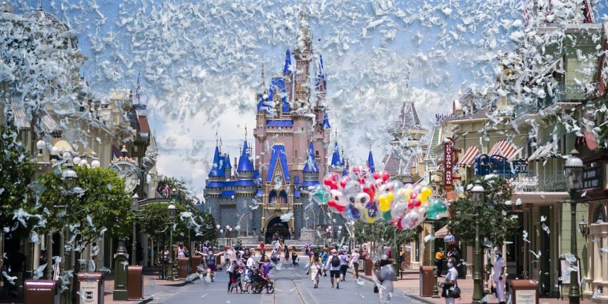 An edited image of snowy weather on Walt Disney World Resort's Main Street, U.S.A..