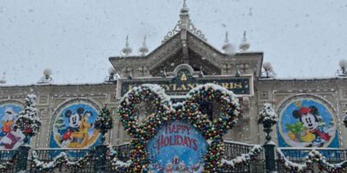 The snow-covered entrance of Disneyland Paris