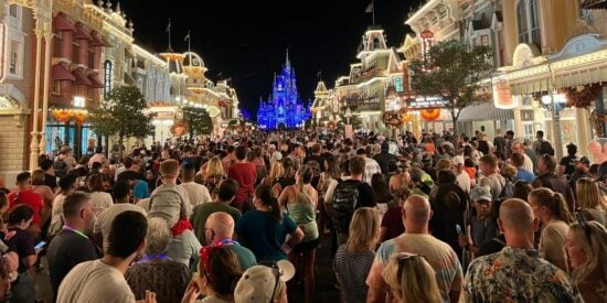 A group of people standing in front of a crowd