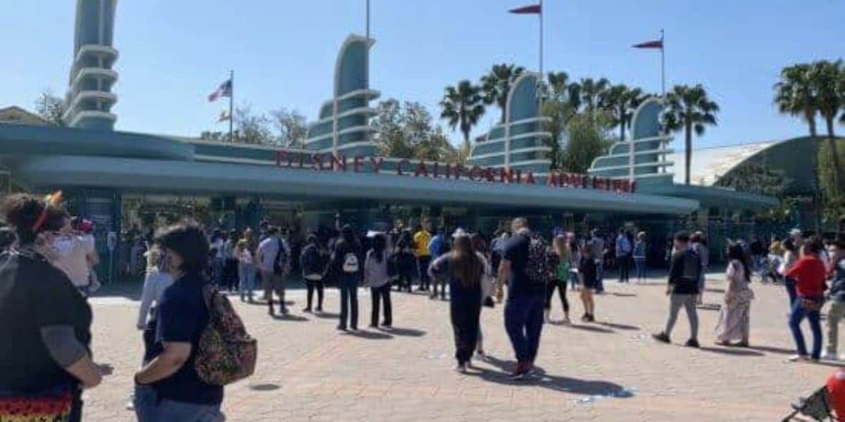 Guests walking into Disney California Adventure Park at Disneyland Resort.