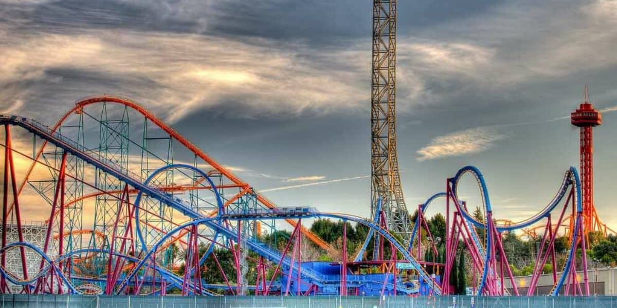 Six Flags Magic Mountain during a cloudy day as a storm approaches.