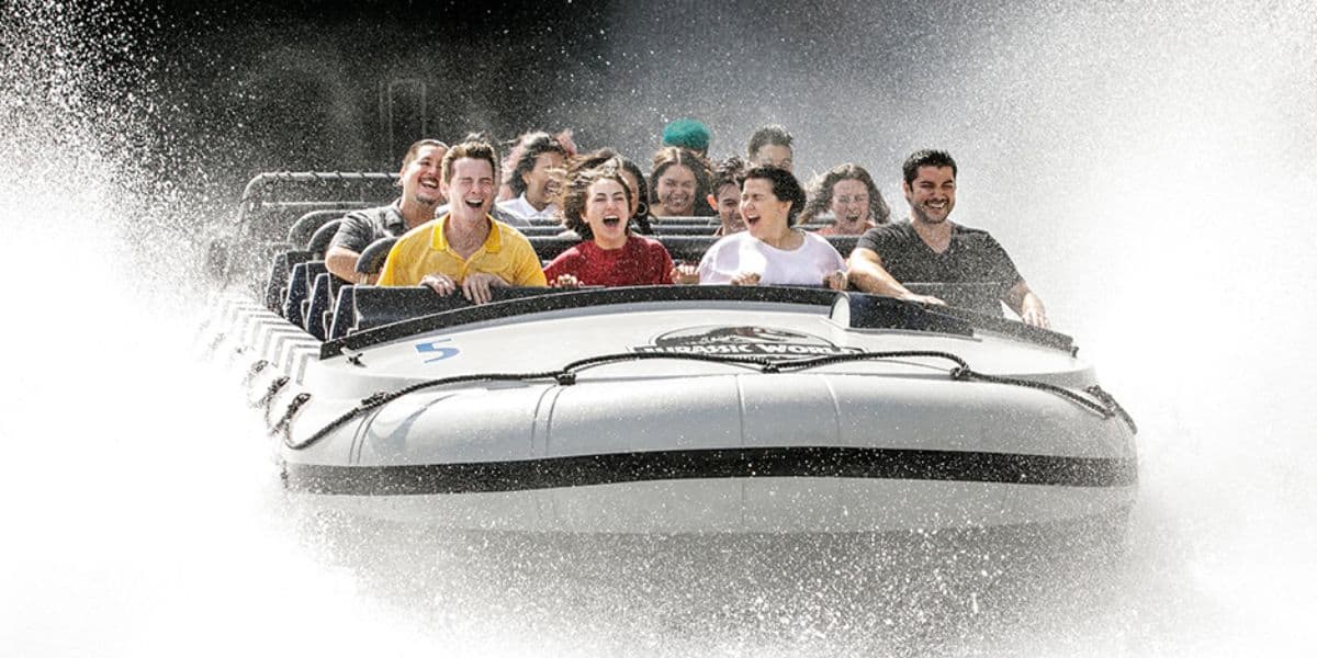 Guests splashdown on Jurassic World: The Ride at Universal Studios
