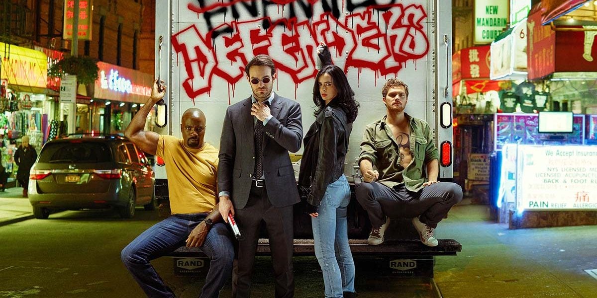 The Defenders, Mike Colter as Luke Cage, Charlie Cox as Daredevil, Krysten Ritter as Jessica Jones, and Finn Jones as Iron Fist
