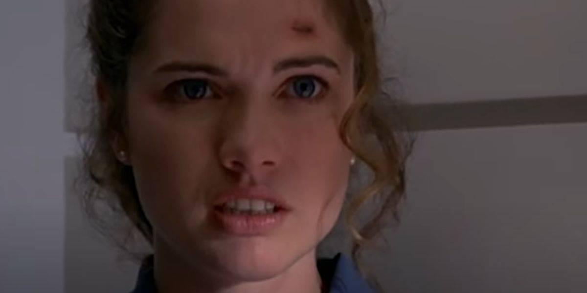 Heather Langenkamp looking horrified in 'Wes Craven's New Nightmare'