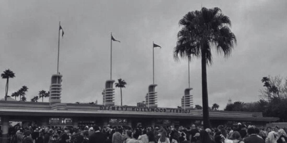 Guests in front of the entrance to Disney's Hollywood Studios.