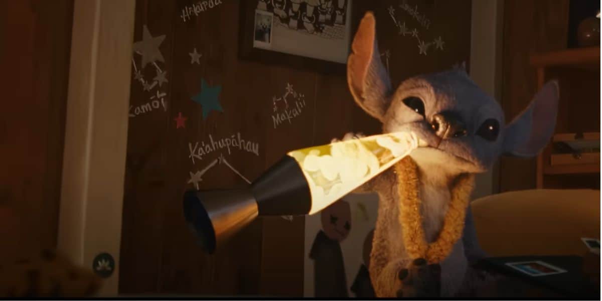 Stitch drinking from a lava lamp in the live action Lilo and Stitch trailer.