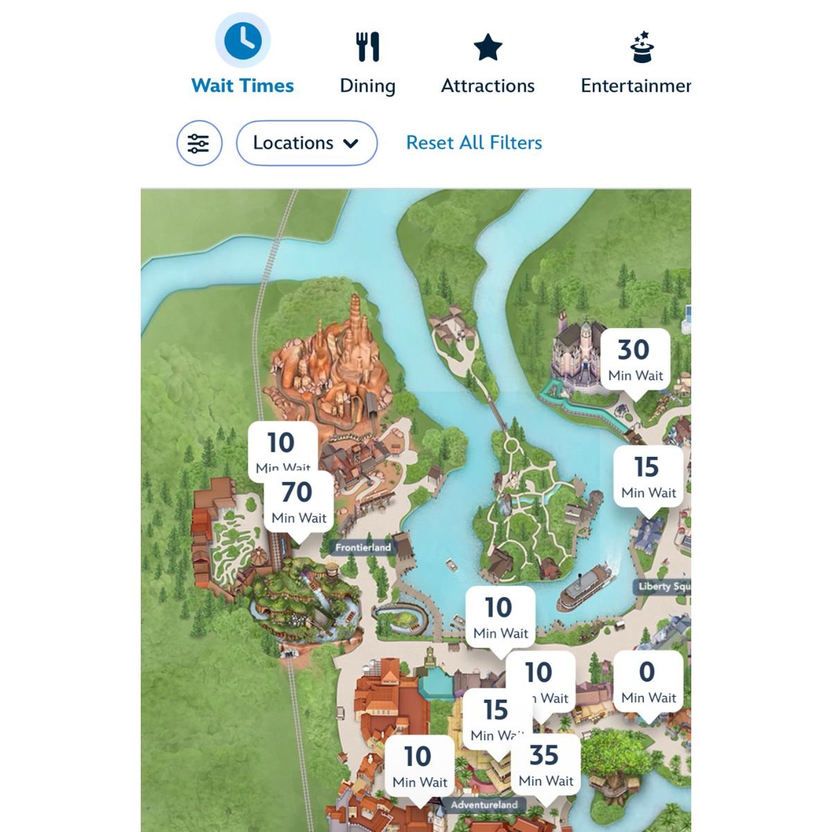 A map of Magic Kingdom theme park shows various attractions with wait times listed in white boxes.