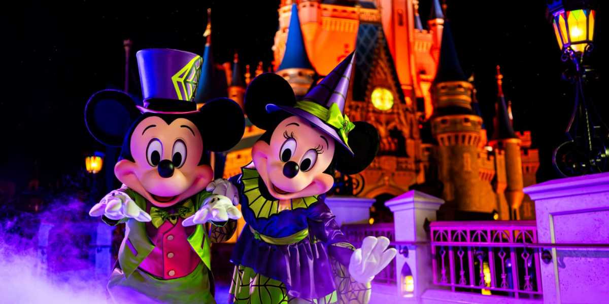 Mickey Mouse and Minnie Mouse in Halloween costumes for Mickey's Not-So-Scary Halloween Party at Walt Disney World Resort
