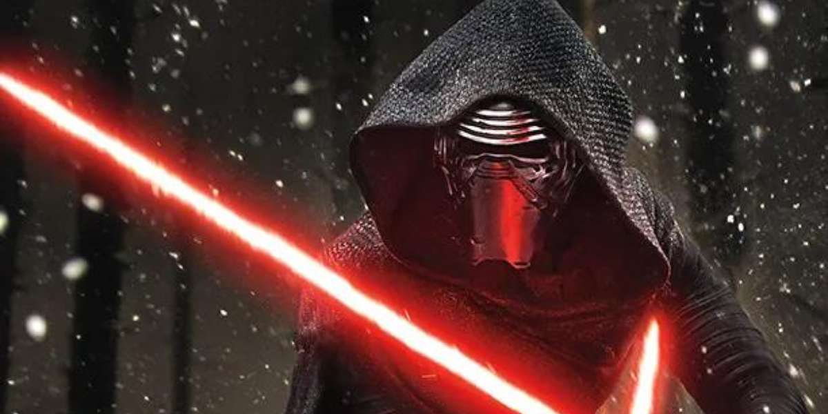 Adam Driver as Kylo Ren wielding his red lightsaber in 'Star Wars: The Force Awakens'