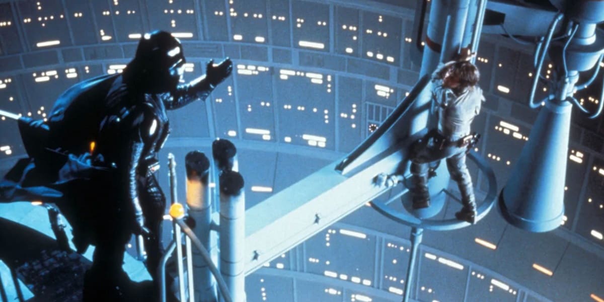 Darth Vader reaching out to Luke Skywalker in Empire Strikes Back