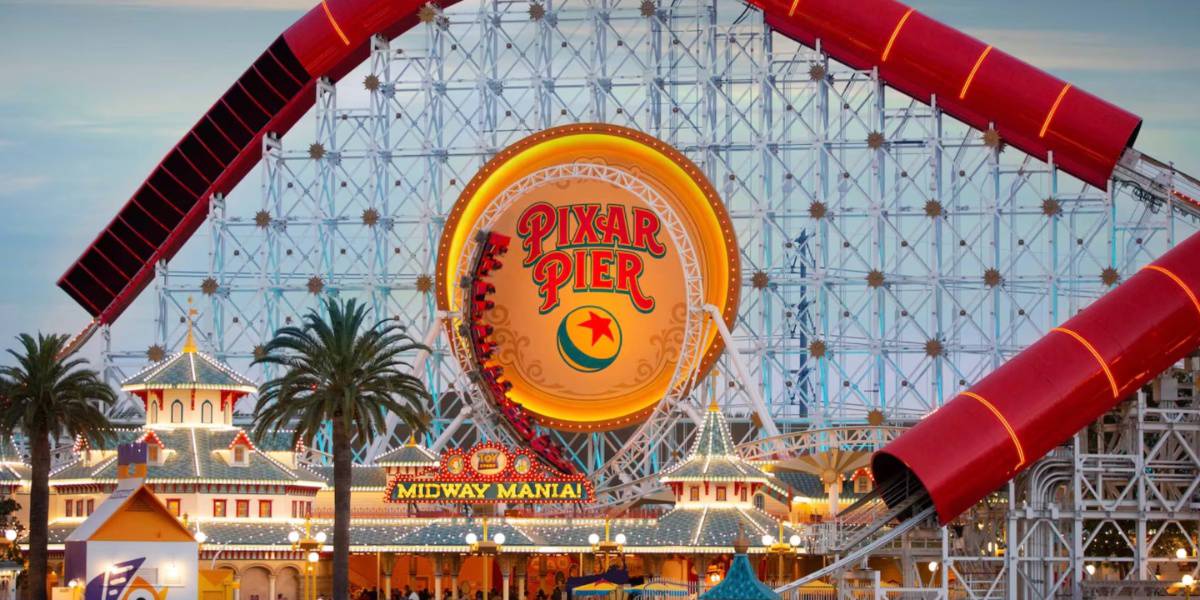 Incredicoaster looping through the Pixar Pier sign at Disney California Adventure