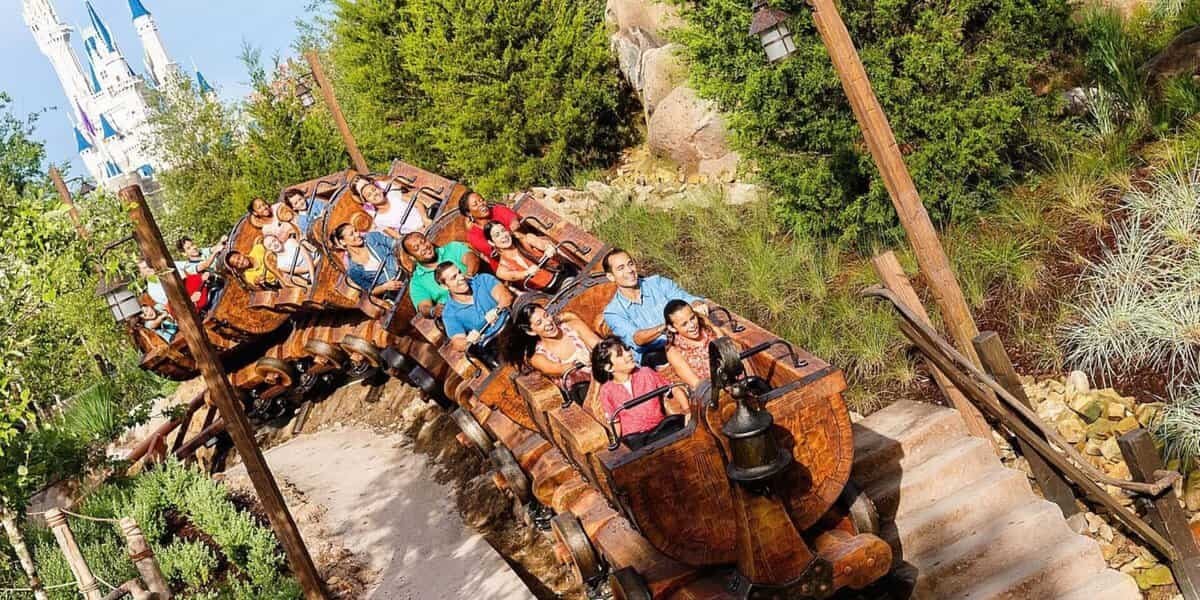 Guests riding Seven Dwarfs Mine Train