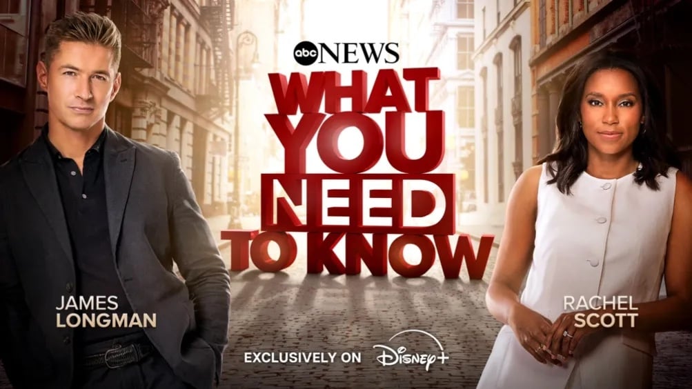Two news anchors, James Longman and Rachel Scott, stand on either side of the bold text "WHAT YOU NEED TO KNOW" with the ABC News logo above and "Exclusively on Disney+" below, promoting the New GMA Show against a city street background.