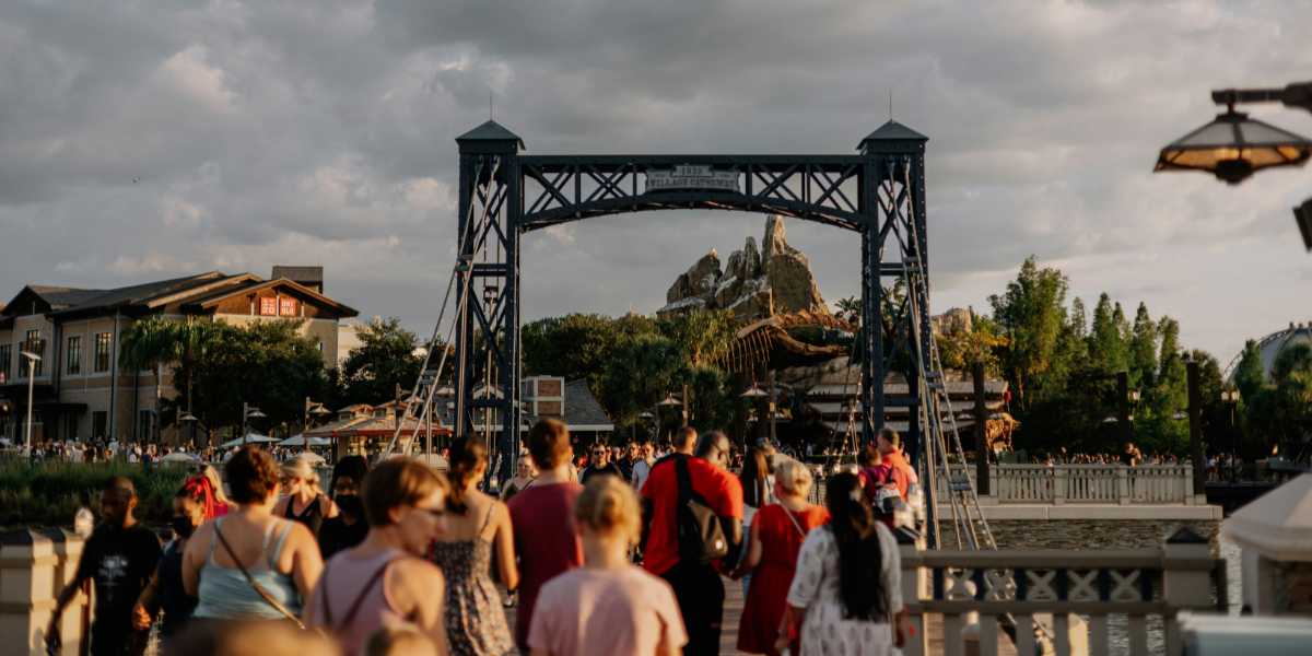 Guests walking across a bridge at Disney Springs expansion.