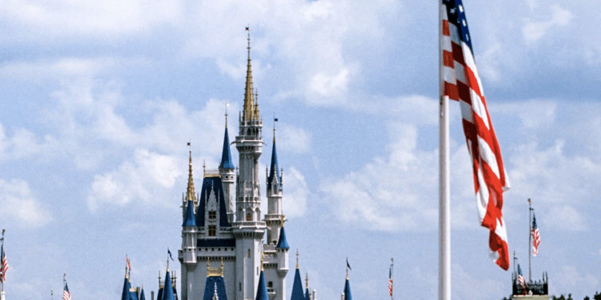 disney world american flag with cinderella castle
