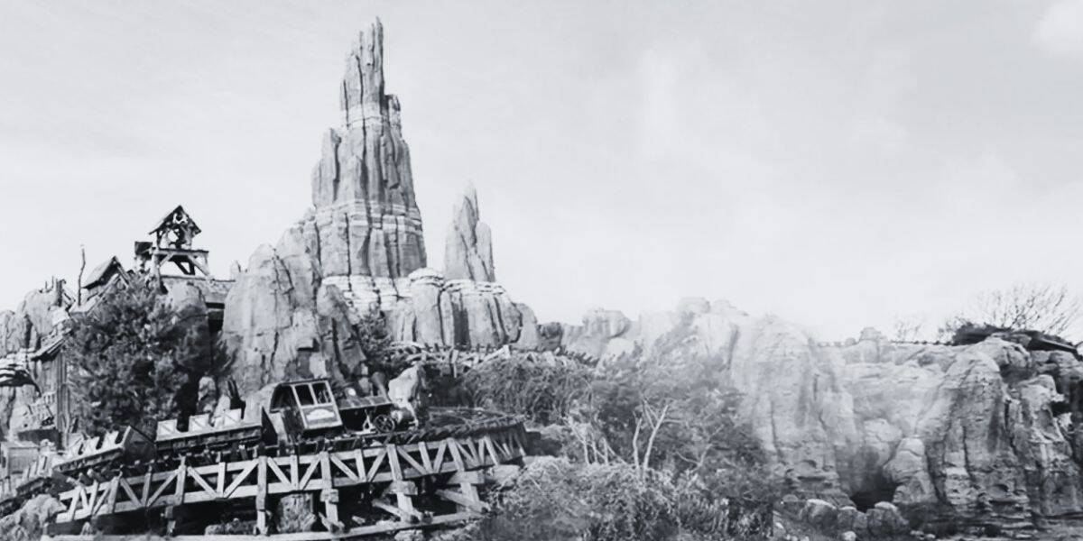 Black and white photo of Big Thunder Mountain Railroad at Disneyland Paris, where a 2023 fire impacted one of the Disney restaurants.
