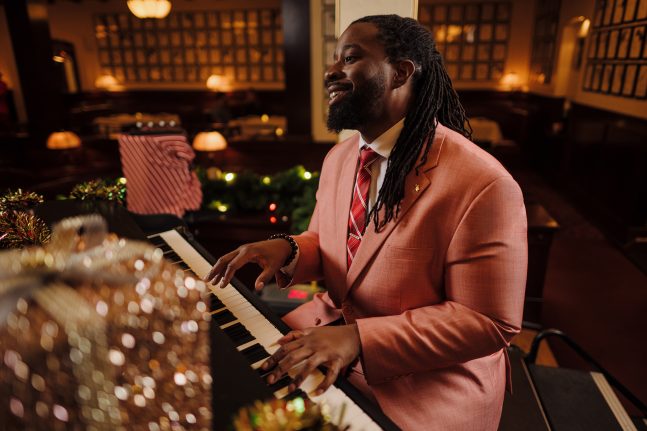 A pianist performs at Jazzy Holidays at the Hollywood Brown Derby