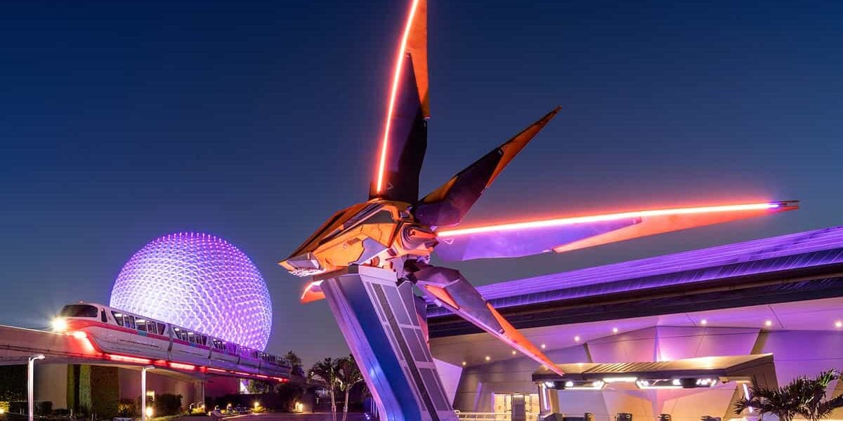 Guardians of the Galaxy: Cosmic Rewind at night with Spaceship Earth in the background at EPCOT in Walt Disney World Resort