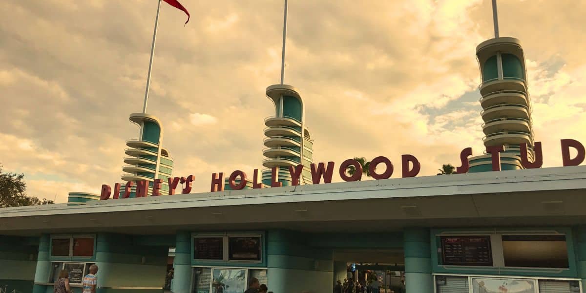 Disney's Hollywood Studios front entrance sign during sunset.