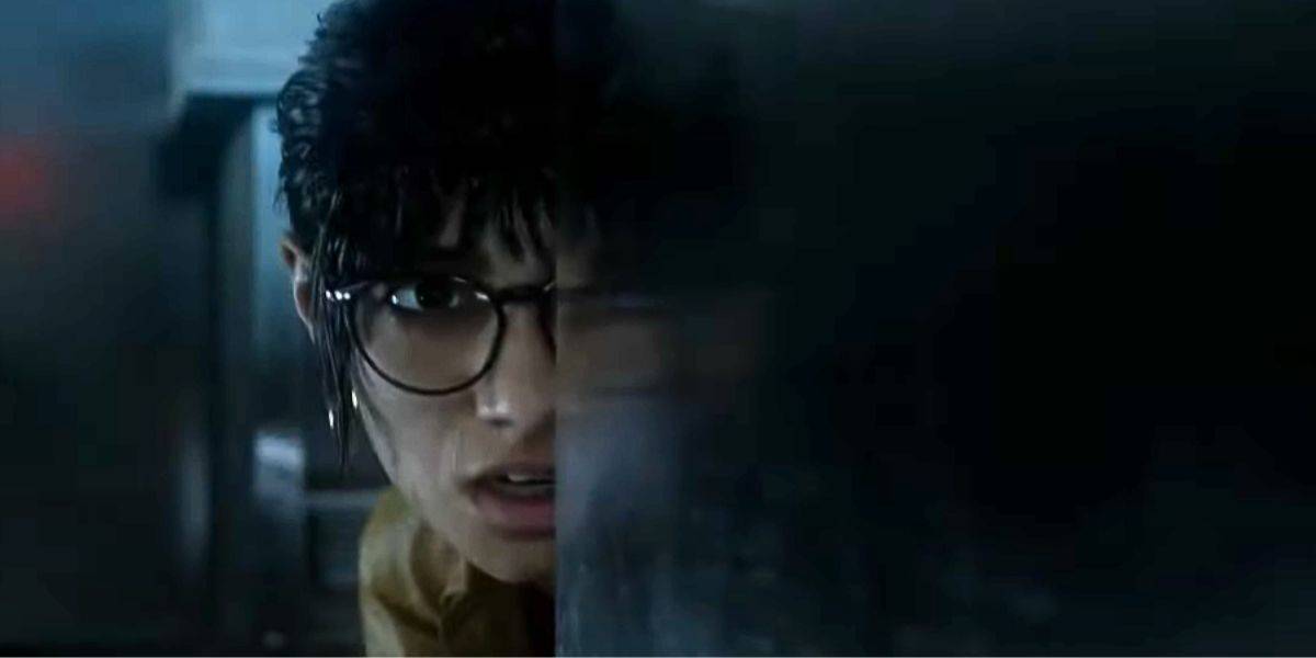 Dr. Maya Joshi hiding in the kitchen in the 'Jurassic Park: Survival' game trailer