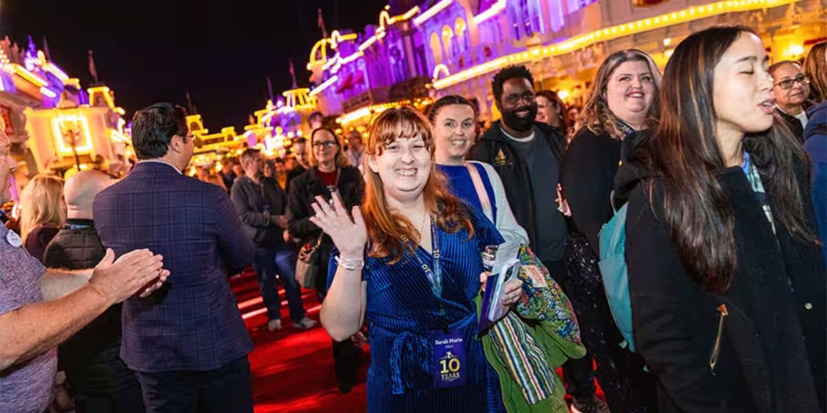 Cast members walk down Main Street, U.S.A. for the Cast Service Celebration