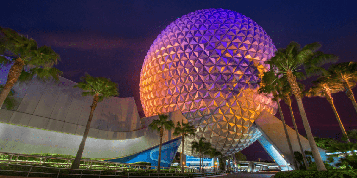 A nighttime view of Spaceship Earth inside of EPCOT at Disney World.