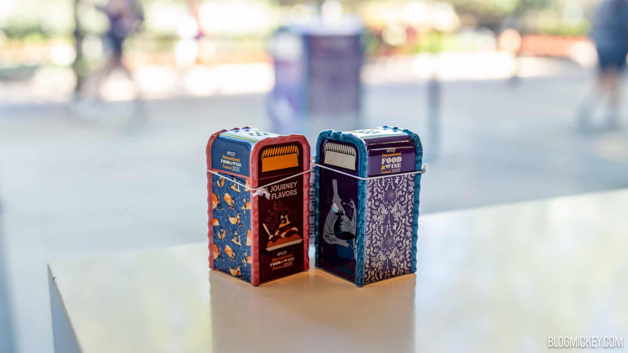 Mini trash can salt and pepper shakers featuring EPCOT Food & Wine Festival branding and designs