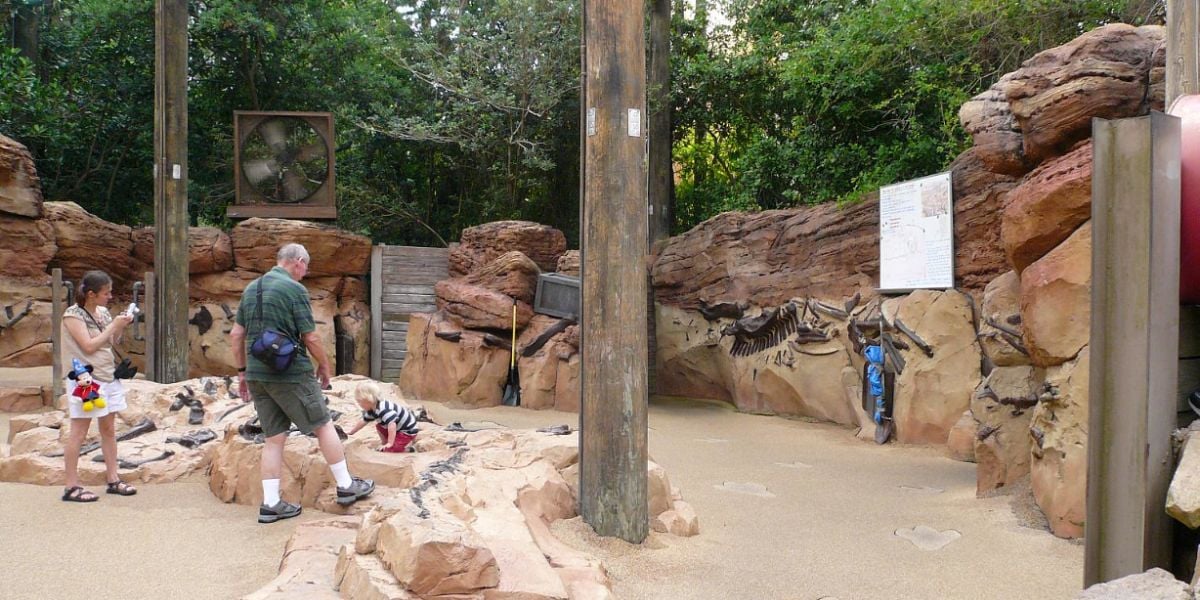 People explore The Boneyard in DinoLand U.S.A.