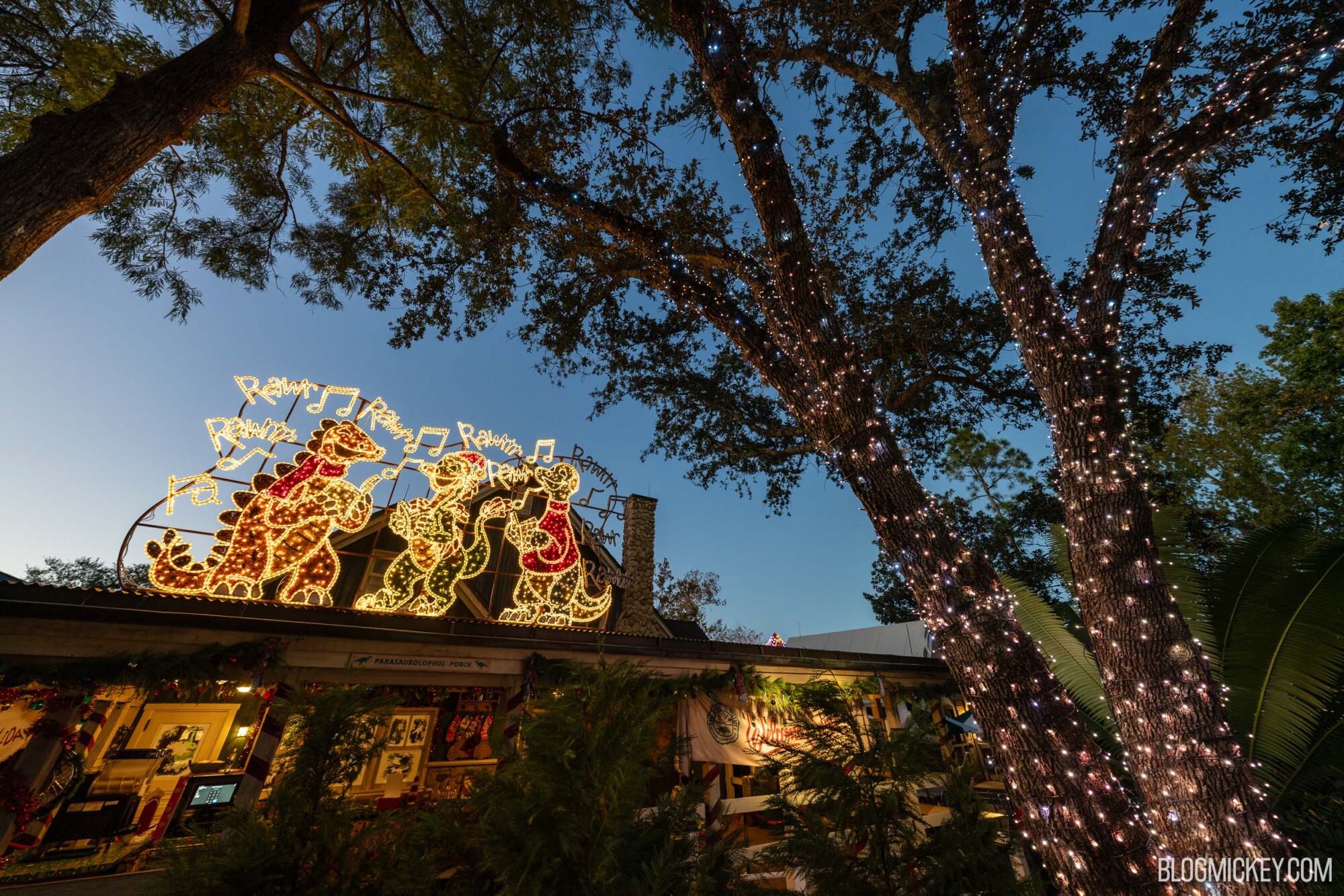 Colorful Christmas lights and decorations at Disney World during the holiday season.