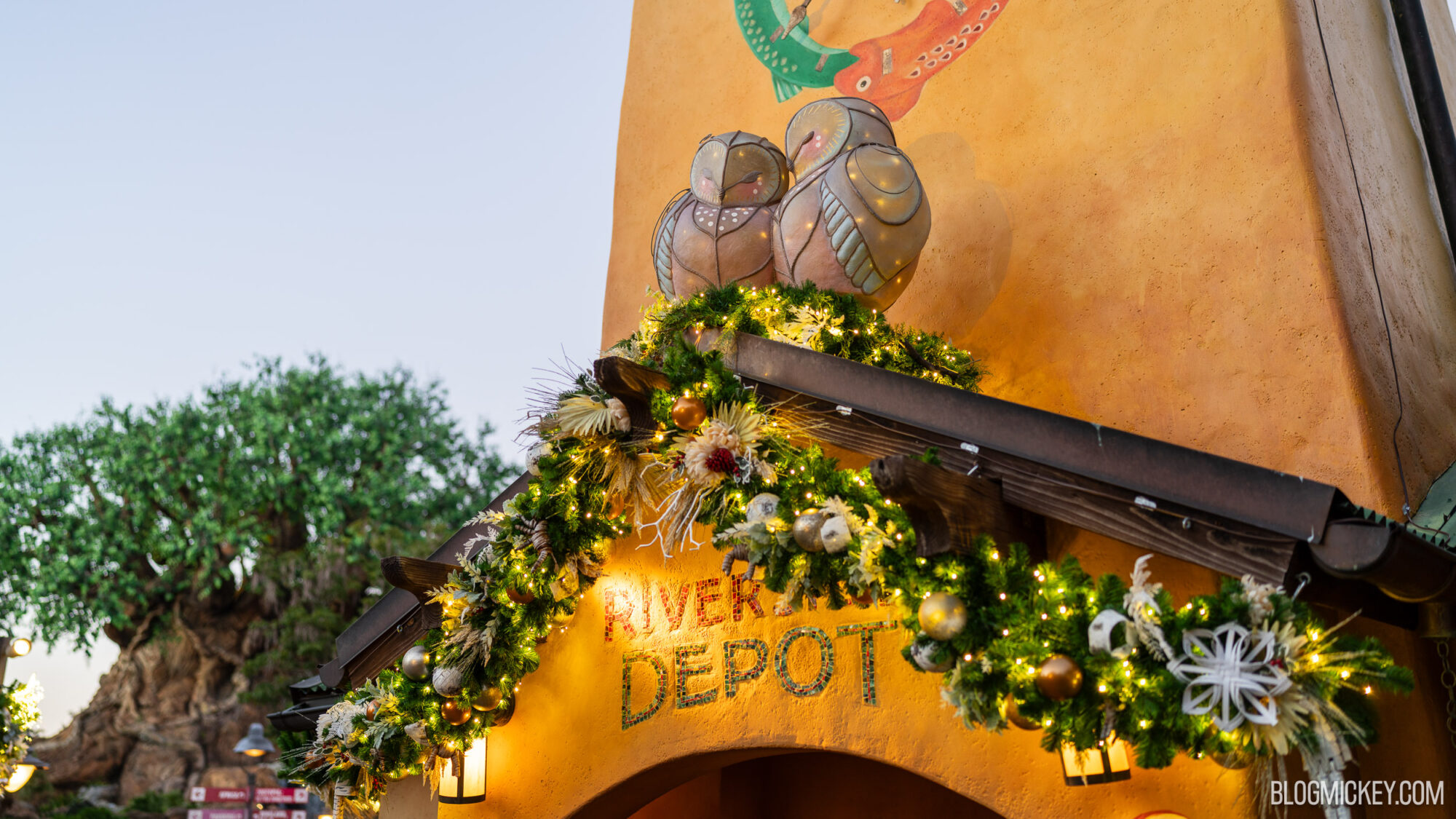 Colorful Christmas decorations at the River Depot with lights and greenery.