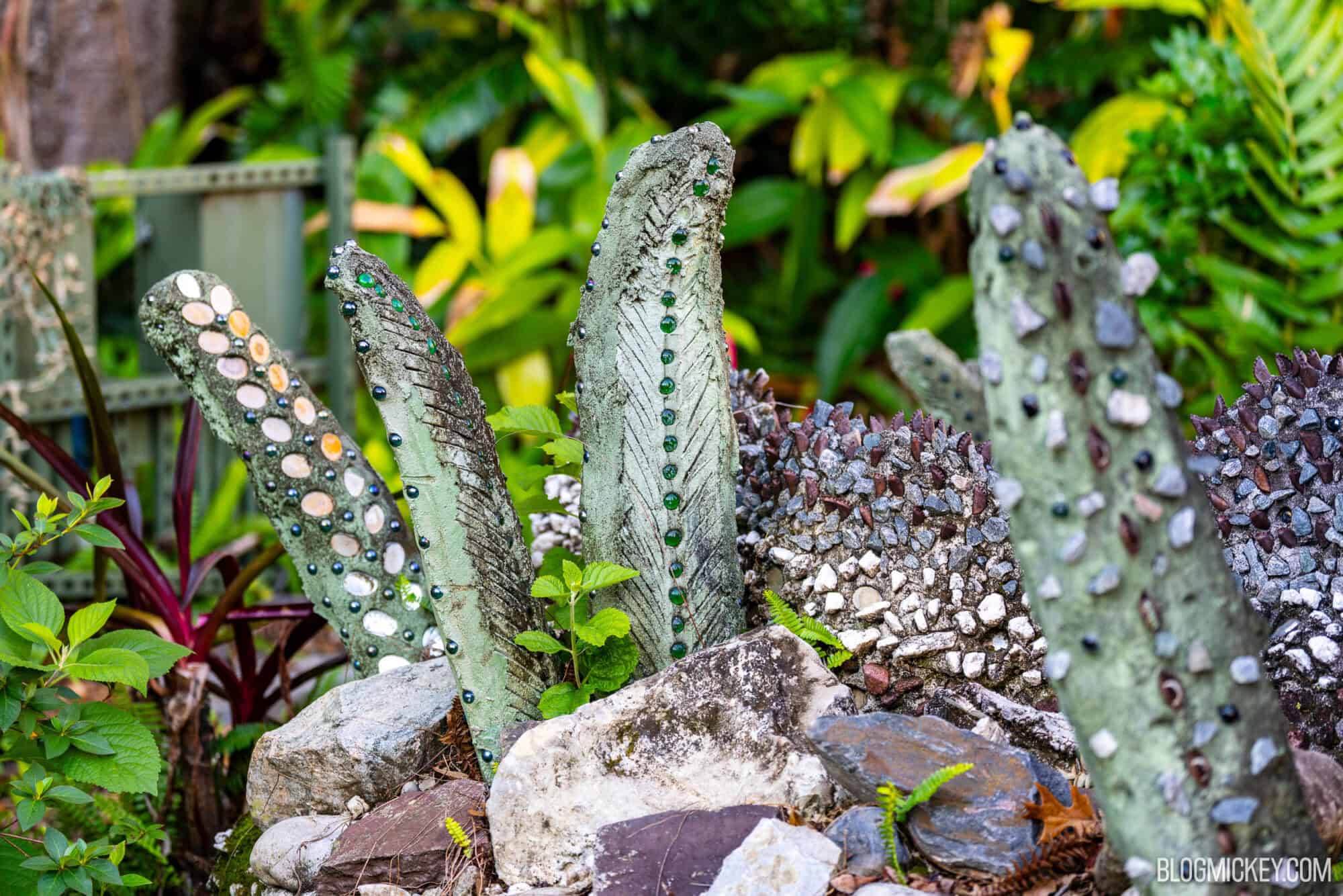 Colorful folk art dinosaur sculptures in DinoLand USA at Disney World.